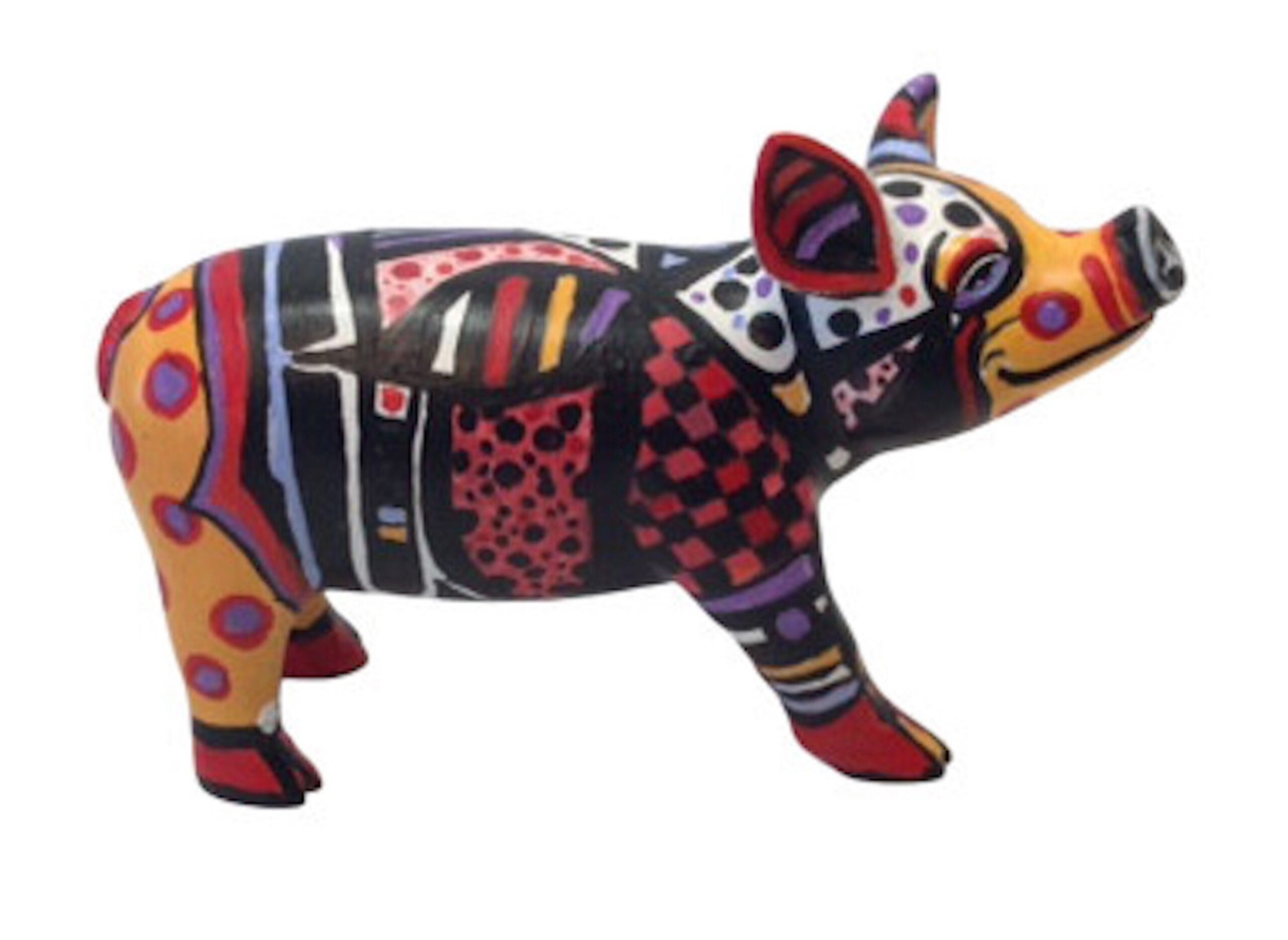 Hand-painted resin pig figurine with a vibrant patchwork design featuring geometric patterns, dots, checks, and bold colours in red, black, yellow, and purple.