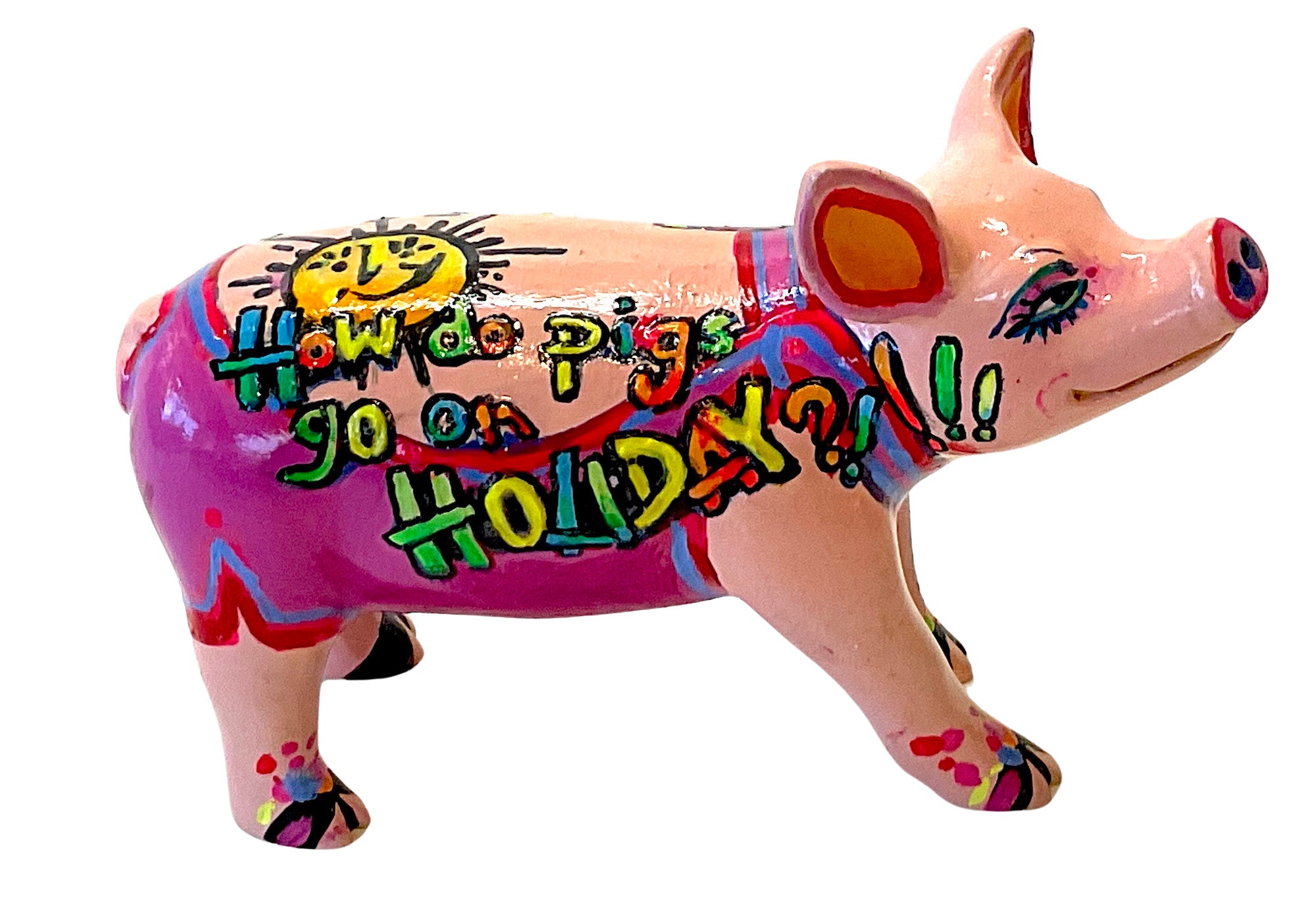 Hand-painted resin mini pig figurine with tropical colours, featuring the phrase “How do pigs go on holiday?!” in bright lettering and playful sun doodle.
