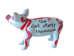Hand-painted resin pig figurine with red and pink swirls on a light blue base, featuring the phrase “the diet starts tomorrow” from the Painted Pigs collection.