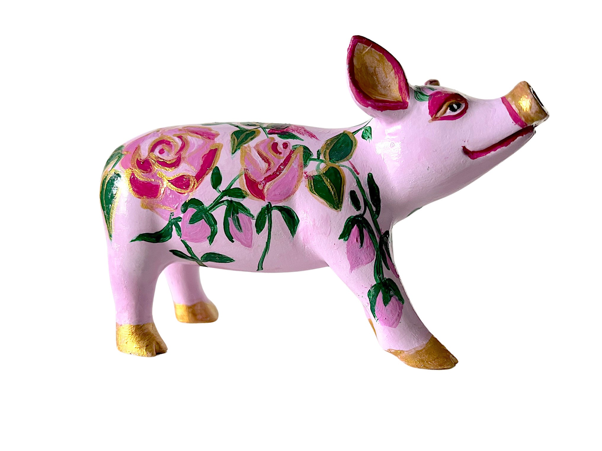 Hand-painted resin mini pig figurine featuring pink roses with green leaves on a pastel pink base, accented with gold-painted hooves, snout, and ears.