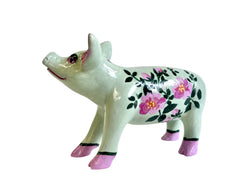 Hand-painted mint green resin mini pig figurine with pink floral design and dark green leafy ac-cents, featuring pink hooves and expressive facial details.