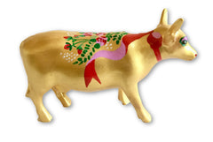 Golden resin mini cow figurine with hand-painted red and pink ribbons, floral accents, and green leaves—a collectible piece from The Painted Pigs.