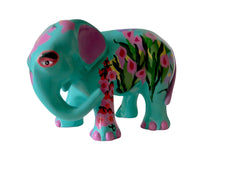 Hand-painted resin elephant figurine with a bright turquoise body, pink ears and toes, and detailed floral designs in pink, red, and green on the legs and sides.