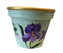 Round hand-painted planter featuring purple irises with green leaves on a mint green base and gold rim; made from fibre/terracotta for indoor or outdoor use.