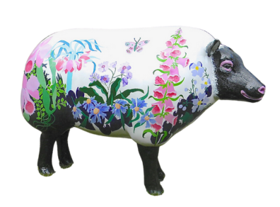 Life-size hand-painted resin garden sheep with colourful floral and greenery design; custom-made for outdoor display with countryside charm.