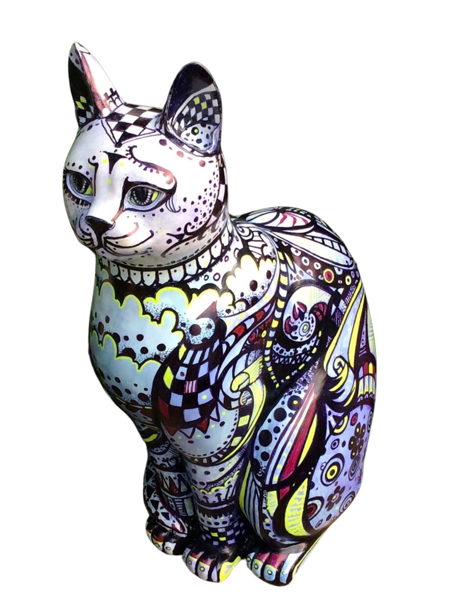 Hand-made resin large cat with intricate mosaic-style design featuring bold geometric and organic patterns in black, white, yellow, red, and lilac, displayed outdoors.
