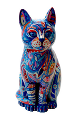 Hand-painted resin cat ornament with bold abstract patterns in blue, red, and gold, featuring swirls, dots, and geometric shapes on a seated figure.