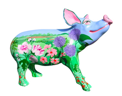 Hand-painted resin pig figurine featuring a vibrant countryside garden scene with pink and purple flowers, lush green foliage, and a blue sky head.